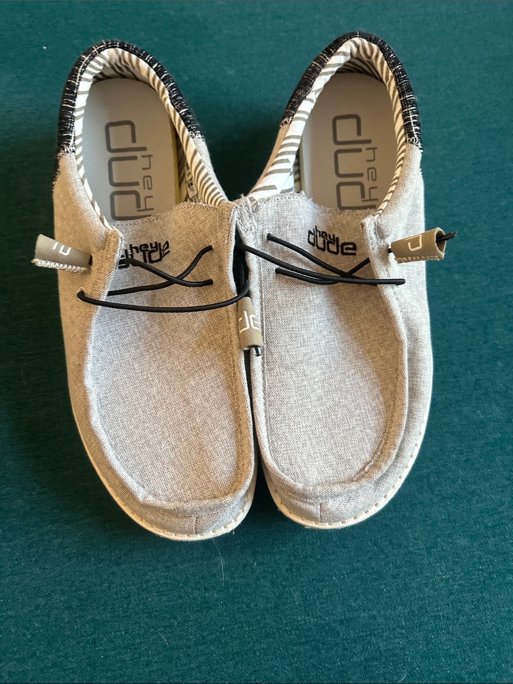 Hey Dude women’s Light Gray Canvas Slip-On Shoes with Black Laces